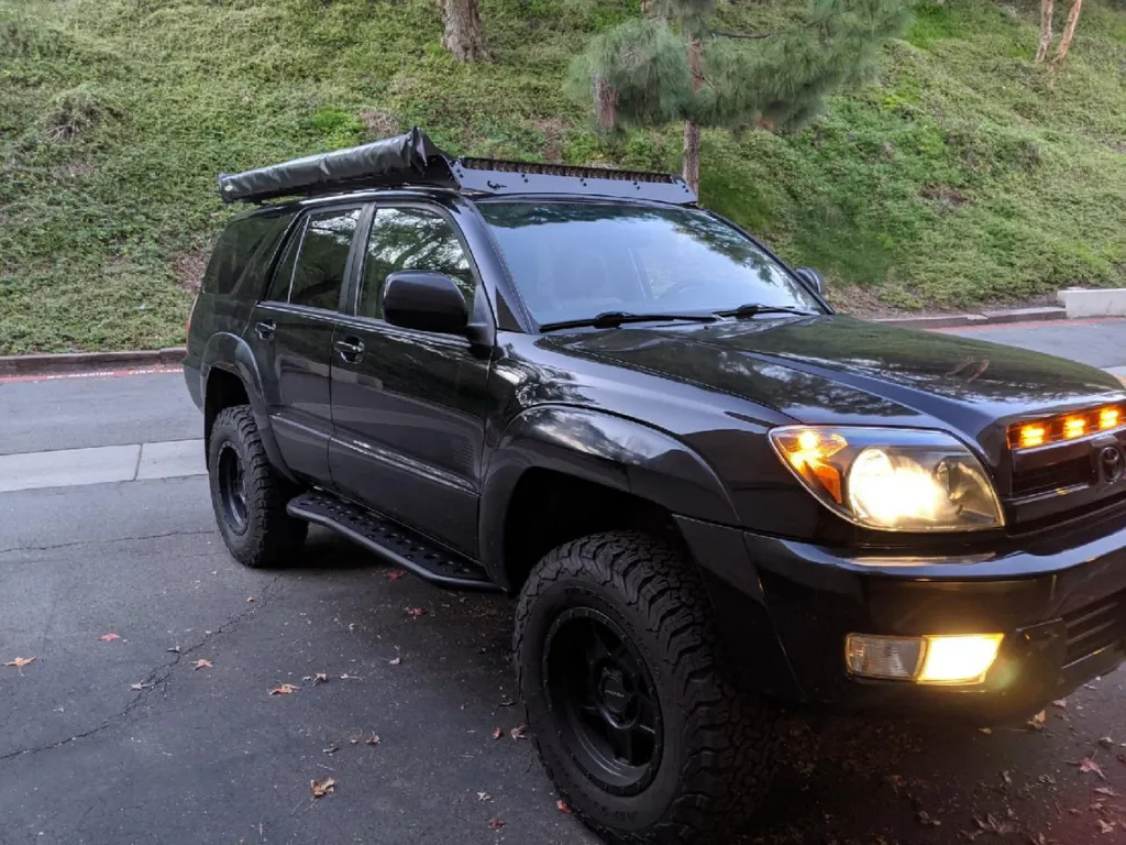 CALI RAISED LED 2003-2009 TOYOTA 4RUNNER STEP EDITION BOLT ON ROCK SLIDERS